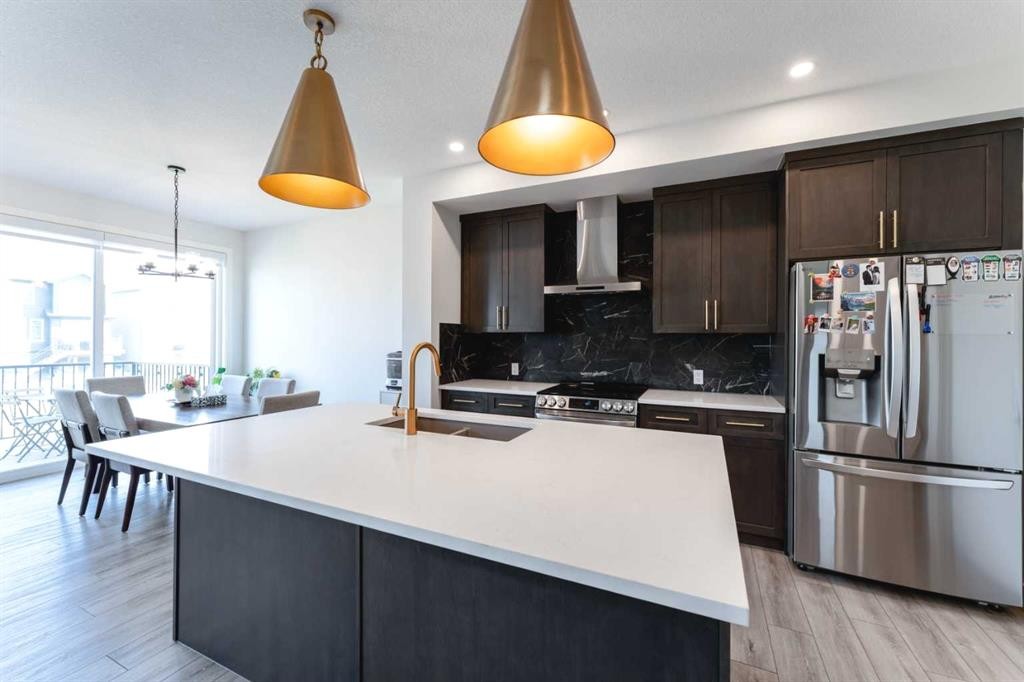 200 Lewiston Drive Ne, Calgary, AB - Indoor Photo Showing Kitchen With Double Sink