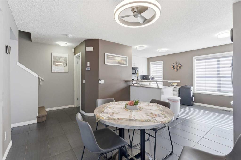 59 New Brighton Common Se, Calgary, AB - Indoor Photo Showing Dining Room