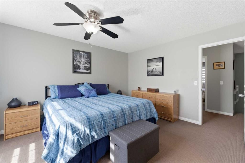 59 New Brighton Common Se, Calgary, AB - Indoor Photo Showing Bedroom