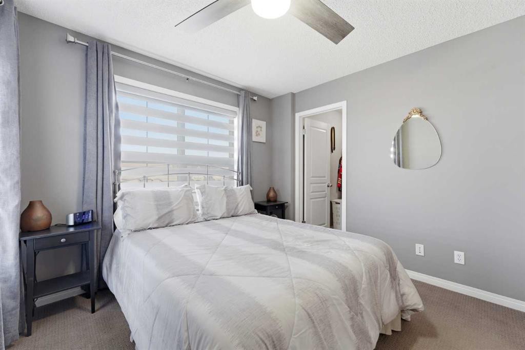 59 New Brighton Common Se, Calgary, AB - Indoor Photo Showing Bedroom
