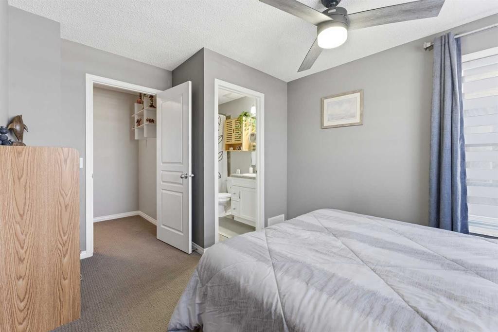 59 New Brighton Common Se, Calgary, AB - Indoor Photo Showing Bedroom
