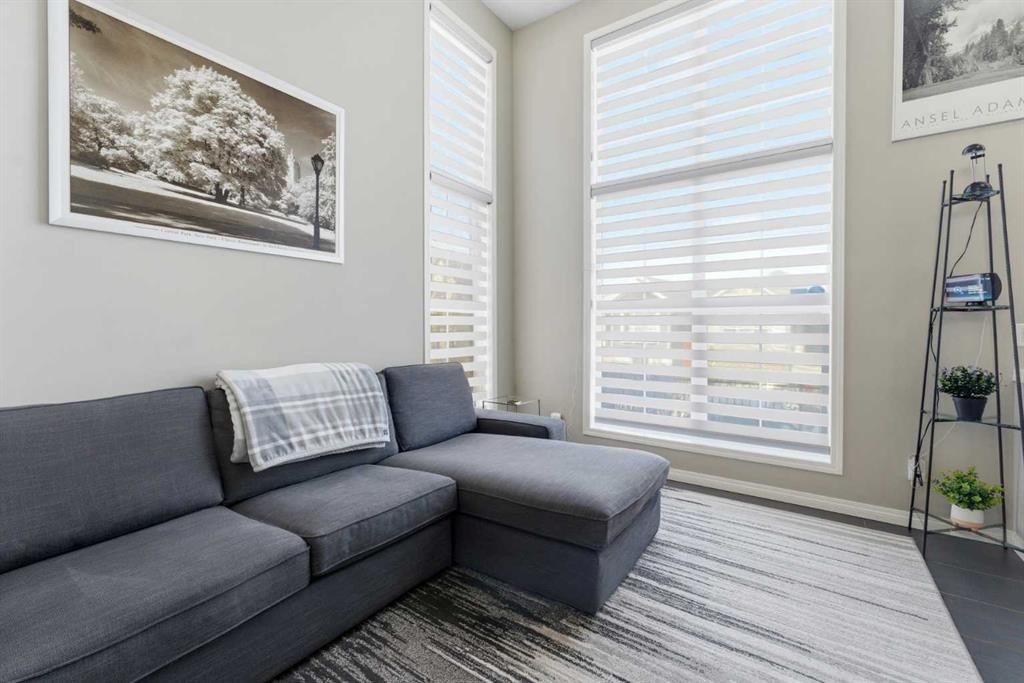 59 New Brighton Common Se, Calgary, AB - Indoor Photo Showing Living Room