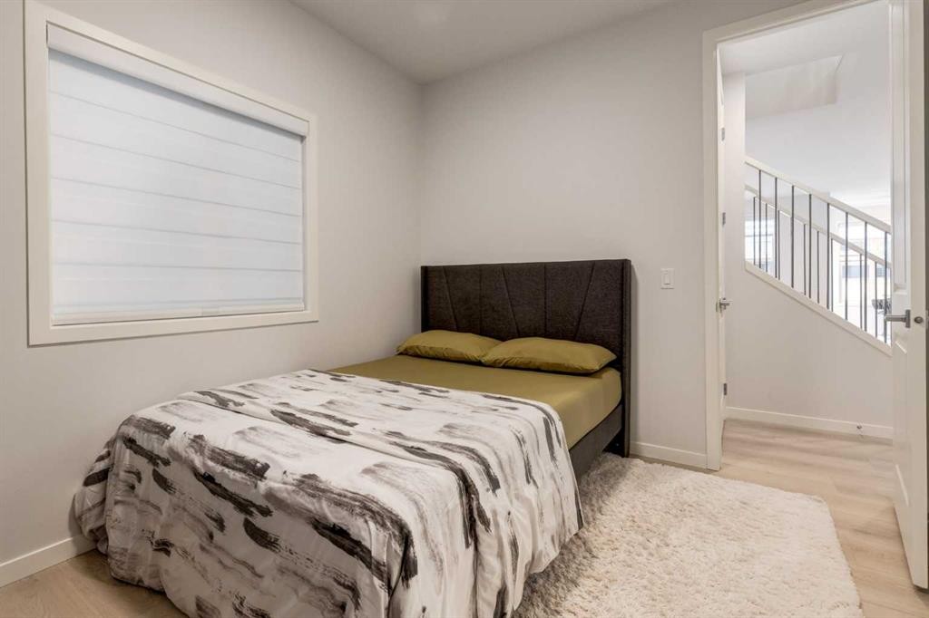 29 Marmot Passage Nw, Calgary, AB - Indoor Photo Showing Bedroom