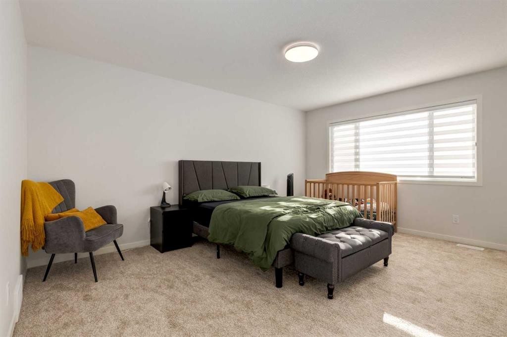 29 Marmot Passage Nw, Calgary, AB - Indoor Photo Showing Bedroom