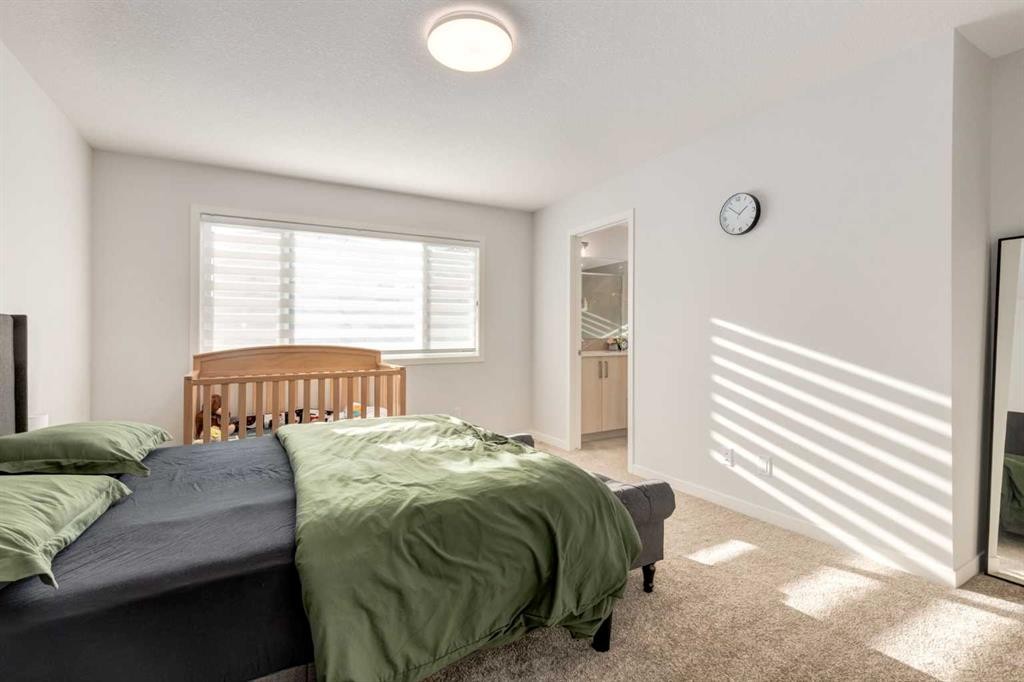 29 Marmot Passage Nw, Calgary, AB - Indoor Photo Showing Bedroom