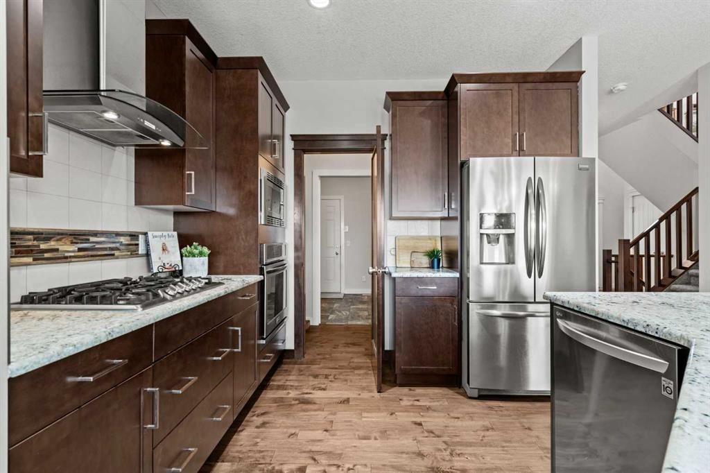 69 Ravenskirk Close Se, Airdrie, AB - Indoor Photo Showing Kitchen