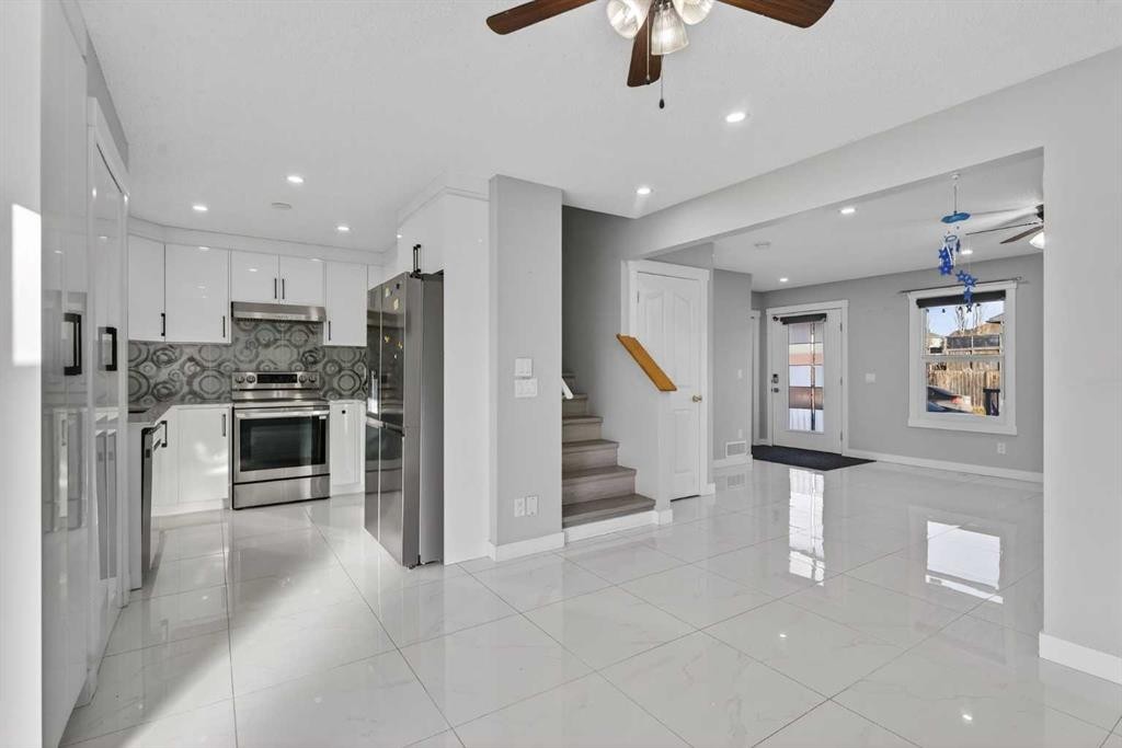 49 Taravista Way Ne, Calgary, AB - Indoor Photo Showing Kitchen With Upgraded Kitchen