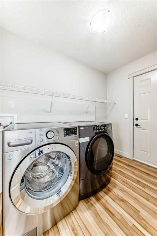 1156 Sherwood Boulevard Nw, Calgary, AB - Indoor Photo Showing Laundry Room