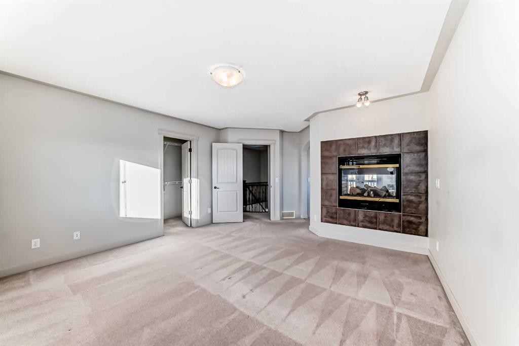 1156 Sherwood Boulevard Nw, Calgary, AB - Indoor With Fireplace