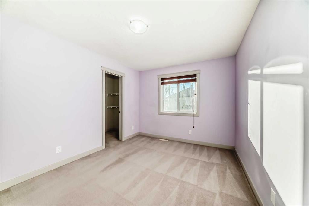 1156 Sherwood Boulevard Nw, Calgary, AB - Indoor Photo Showing Other Room