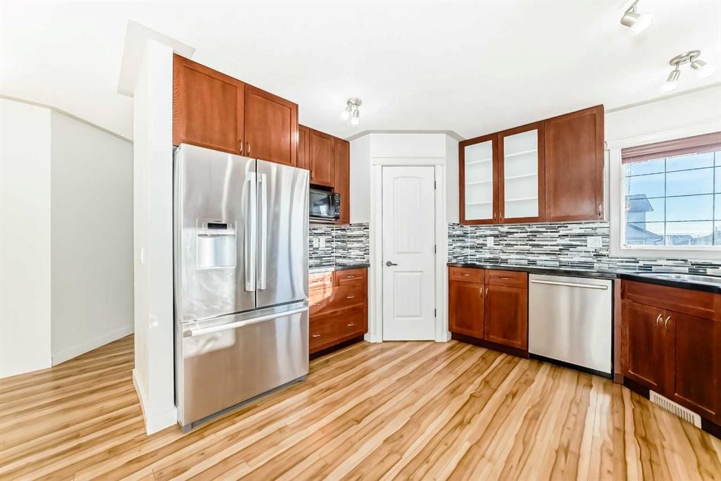 1156 Sherwood Boulevard Nw, Calgary, AB - Indoor Photo Showing Kitchen With Double Sink