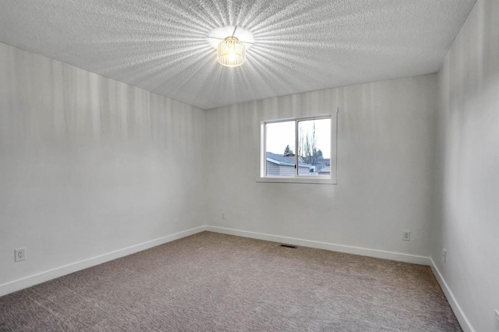 96 Covington Road Ne, Calgary, AB - Indoor Photo Showing Other Room