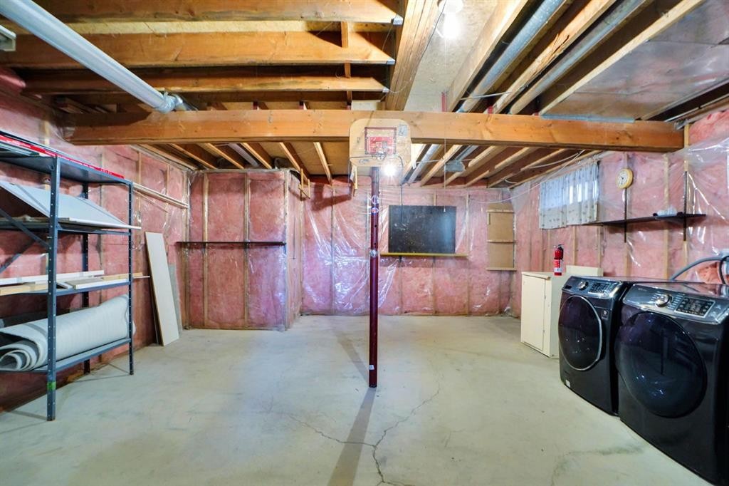96 Covington Road Ne, Calgary, AB - Indoor Photo Showing Laundry Room