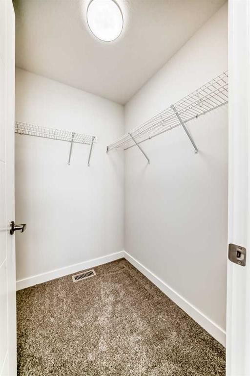 100 Corner Glen Manor Ne, Calgary, AB - Indoor With Storage