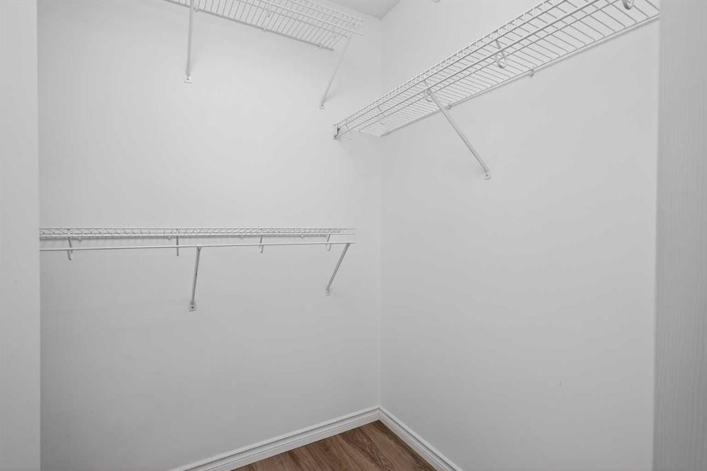 1408-1000 Somervale Court Sw, Calgary, AB - Indoor With Storage