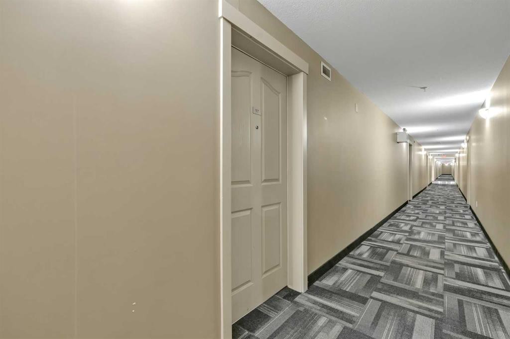 117-7130 80 Avenue Ne, Calgary, AB - Indoor Photo Showing Other Room