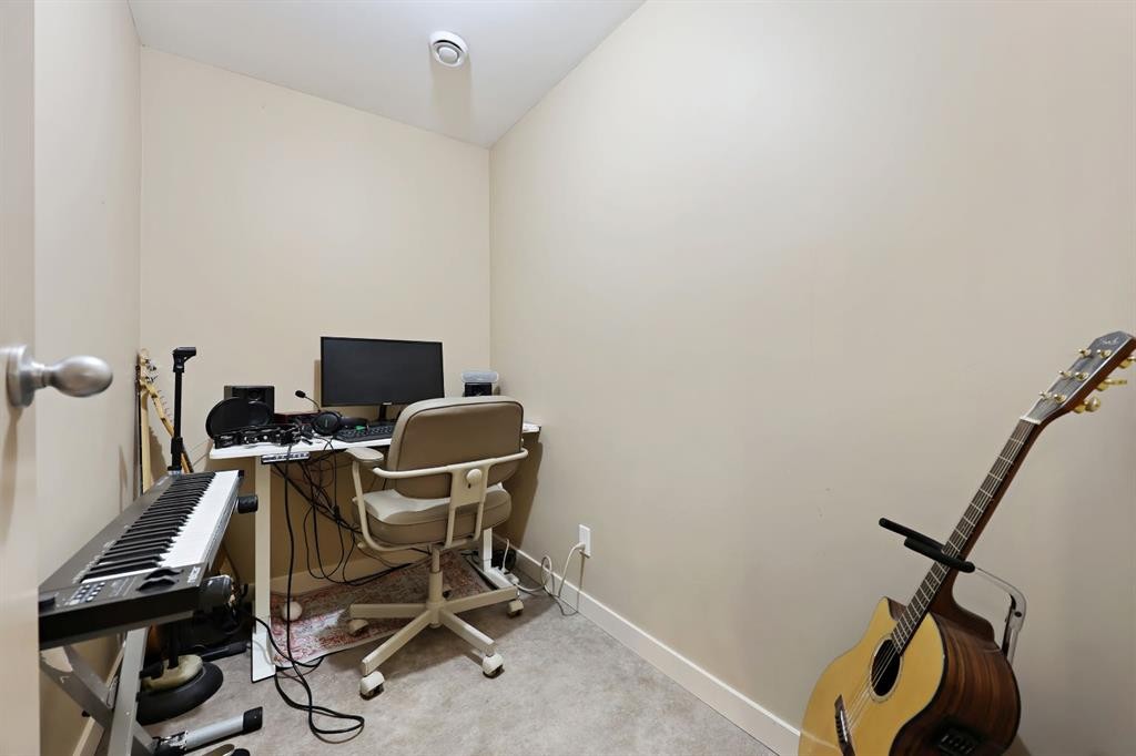256 Lysander Place Se, Calgary, AB - Indoor Photo Showing Gym Room