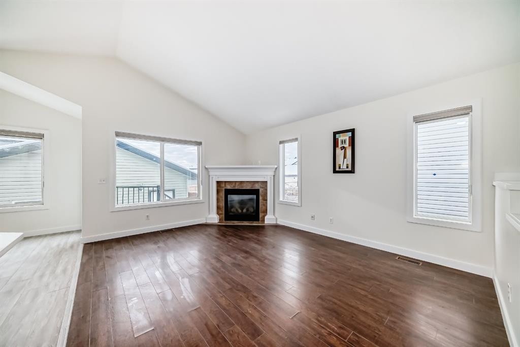 226 Saddlebrook Circle Ne, Calgary, AB - Indoor Photo Showing Living Room With Fireplace