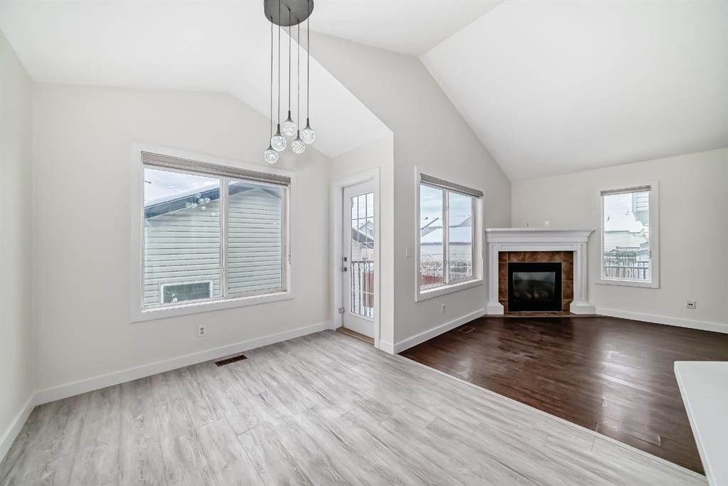 226 Saddlebrook Circle Ne, Calgary, AB - Indoor Photo Showing Living Room With Fireplace