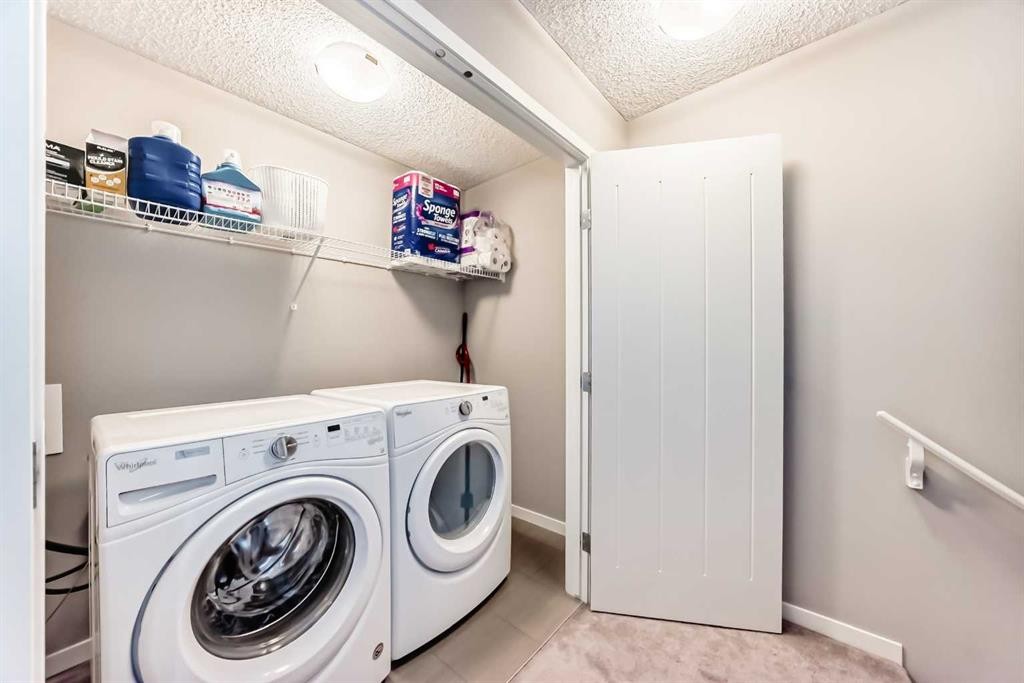 309 Nolanlake Villas Nw, Calgary, AB - Indoor Photo Showing Laundry Room
