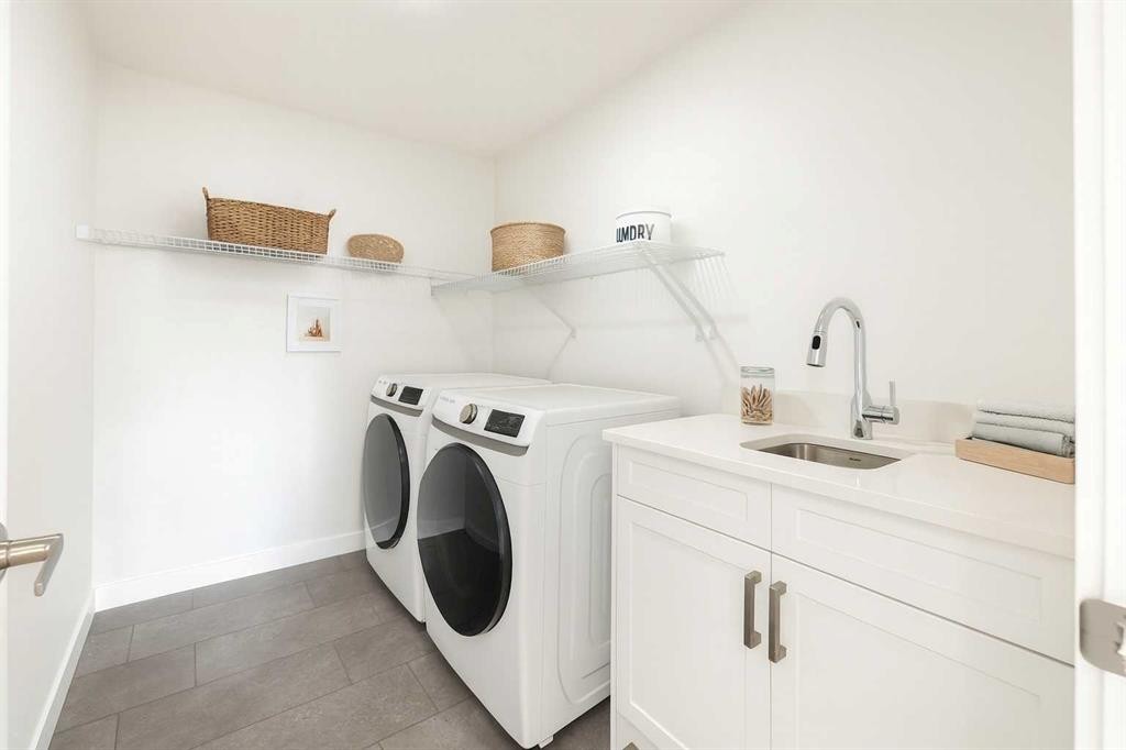 63 Amber View, Balzac, AB - Indoor Photo Showing Laundry Room
