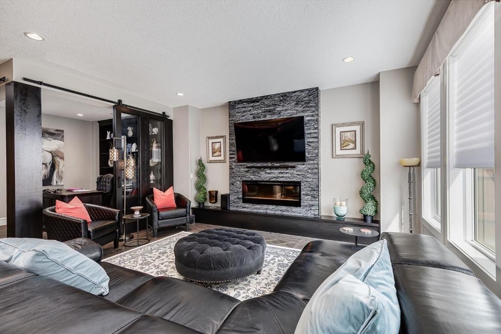 278 Legacy View Se, Calgary, AB - Indoor Photo Showing Living Room With Fireplace