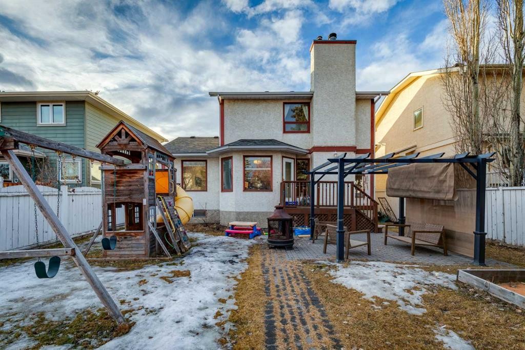 124 Woodmark Crescent Sw, Calgary, AB - Outdoor