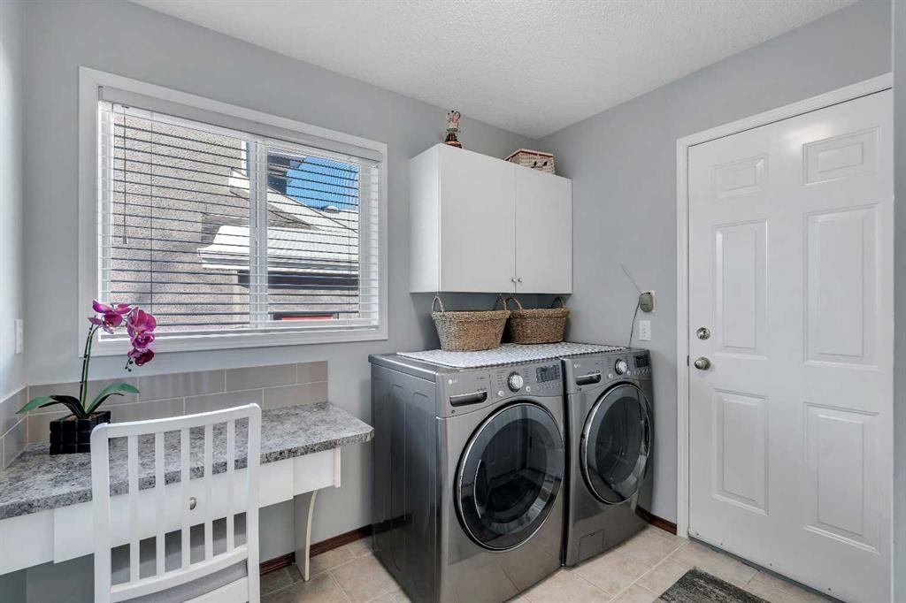 78 Mckenzie Lake Place Se, Calgary, AB - Indoor Photo Showing Laundry Room