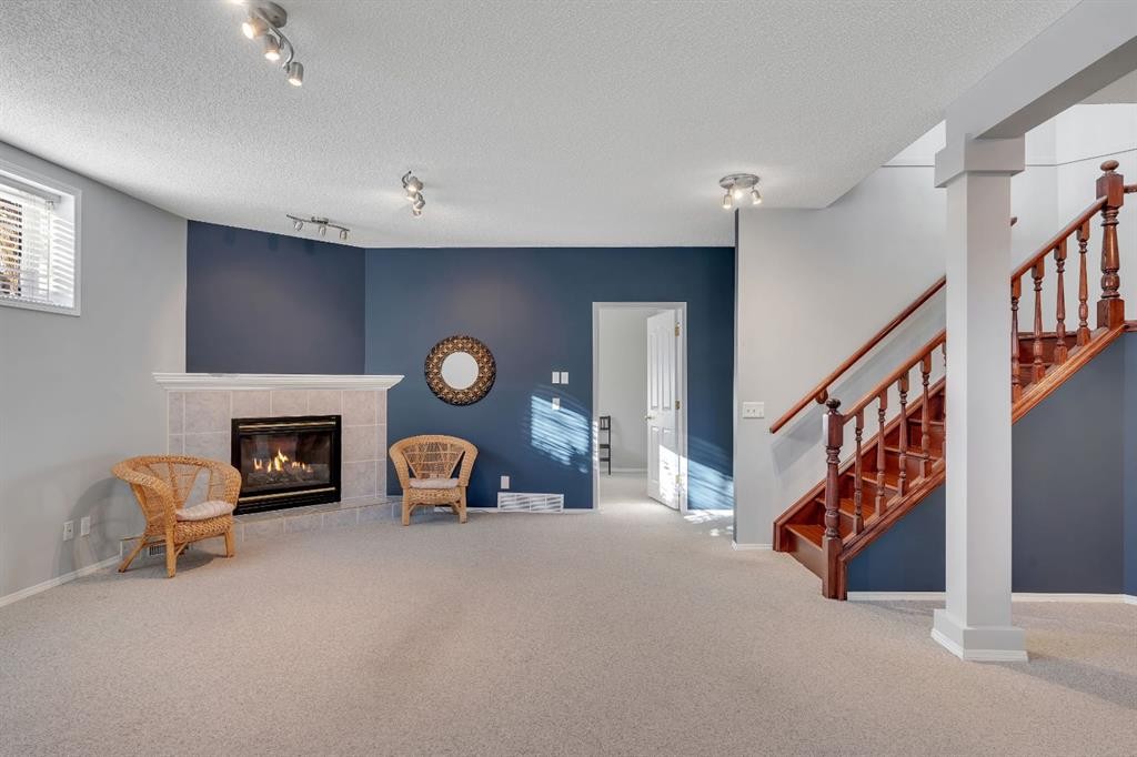 78 Mckenzie Lake Place Se, Calgary, AB - Indoor With Fireplace