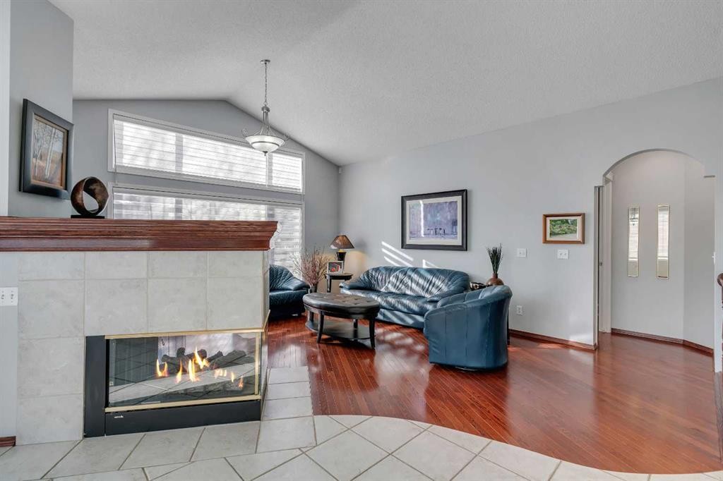 78 Mckenzie Lake Place Se, Calgary, AB - Indoor Photo Showing Living Room With Fireplace