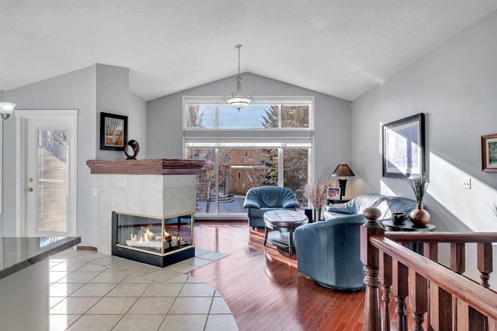 78 Mckenzie Lake Place Se, Calgary, AB - Indoor Photo Showing Living Room With Fireplace