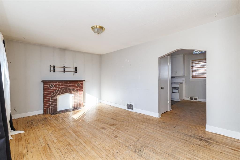 2820 Parkdale Boulevard Nw, Calgary, AB - Indoor Photo Showing Other Room With Fireplace