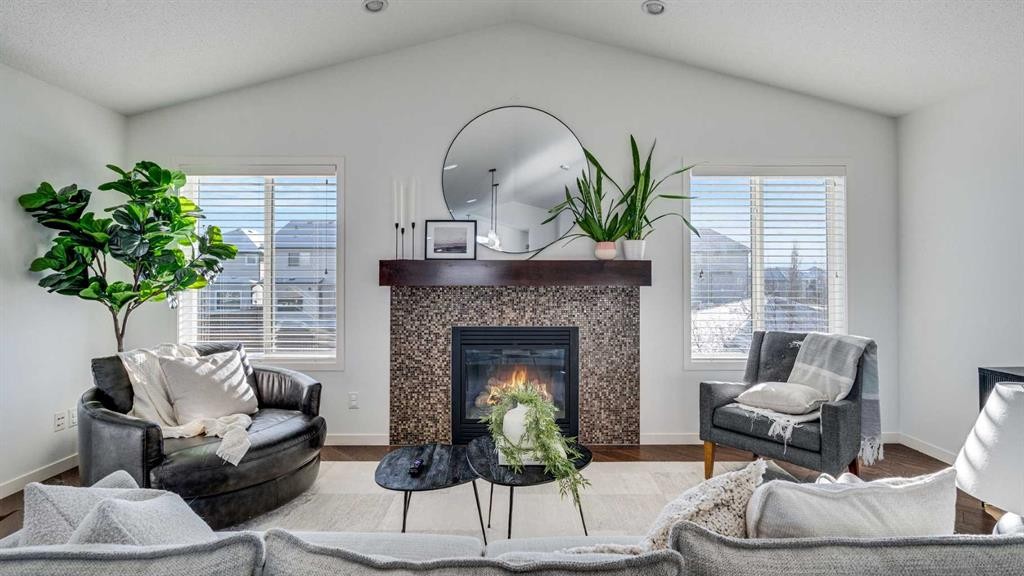 389 Cranberry Circle Se, Calgary, AB - Indoor Photo Showing Living Room With Fireplace