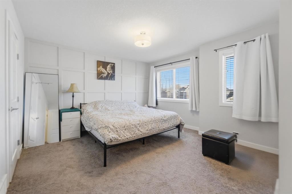 115 Bayview Circle, Airdrie, AB - Indoor Photo Showing Bedroom