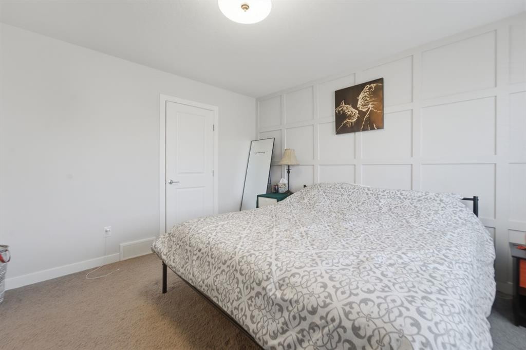 115 Bayview Circle, Airdrie, AB - Indoor Photo Showing Bedroom