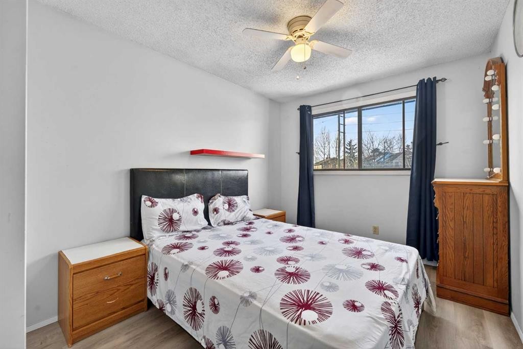 195 Fallswater Road Ne, Calgary, AB - Indoor Photo Showing Bedroom