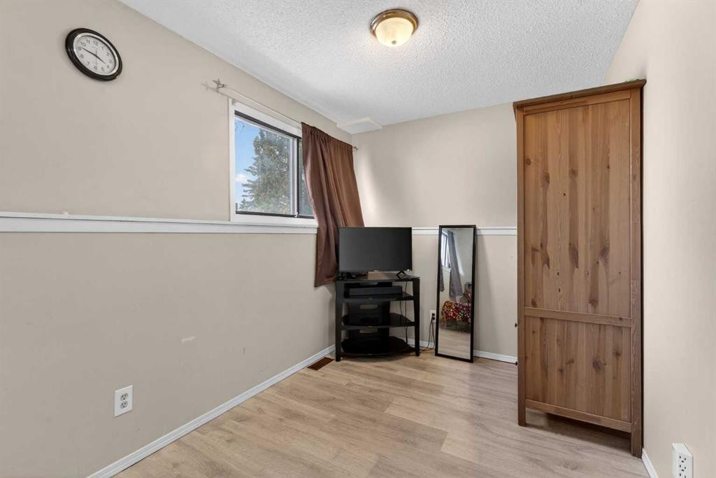 195 Fallswater Road Ne, Calgary, AB - Indoor Photo Showing Other Room