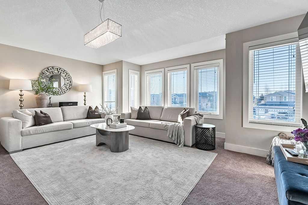 112 Kinniburgh Close, Chestermere, AB - Indoor Photo Showing Living Room