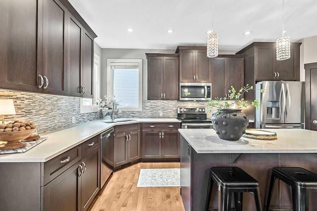 112 Kinniburgh Close, Chestermere, AB - Indoor Photo Showing Kitchen With Upgraded Kitchen