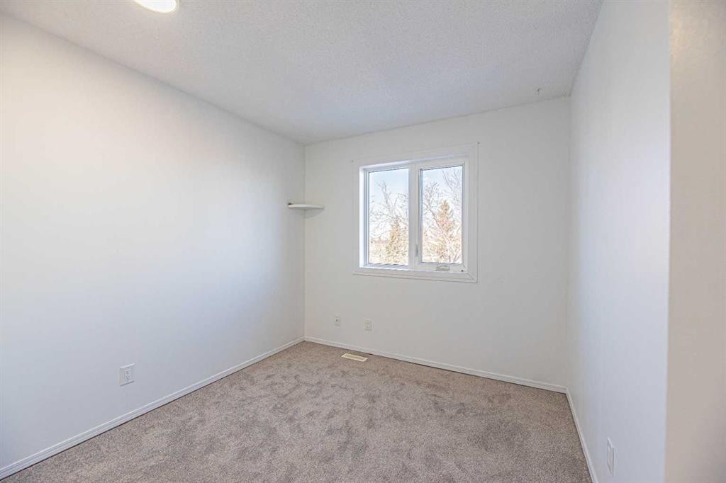 38 Martindale Drive Ne, Calgary, AB - Indoor Photo Showing Other Room