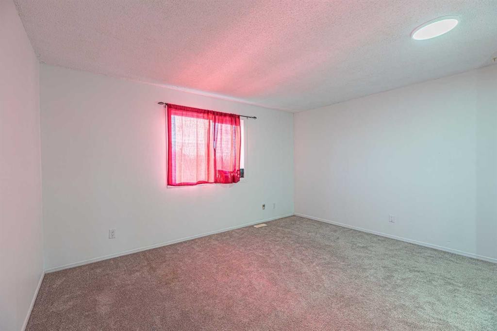 38 Martindale Drive Ne, Calgary, AB - Indoor Photo Showing Other Room