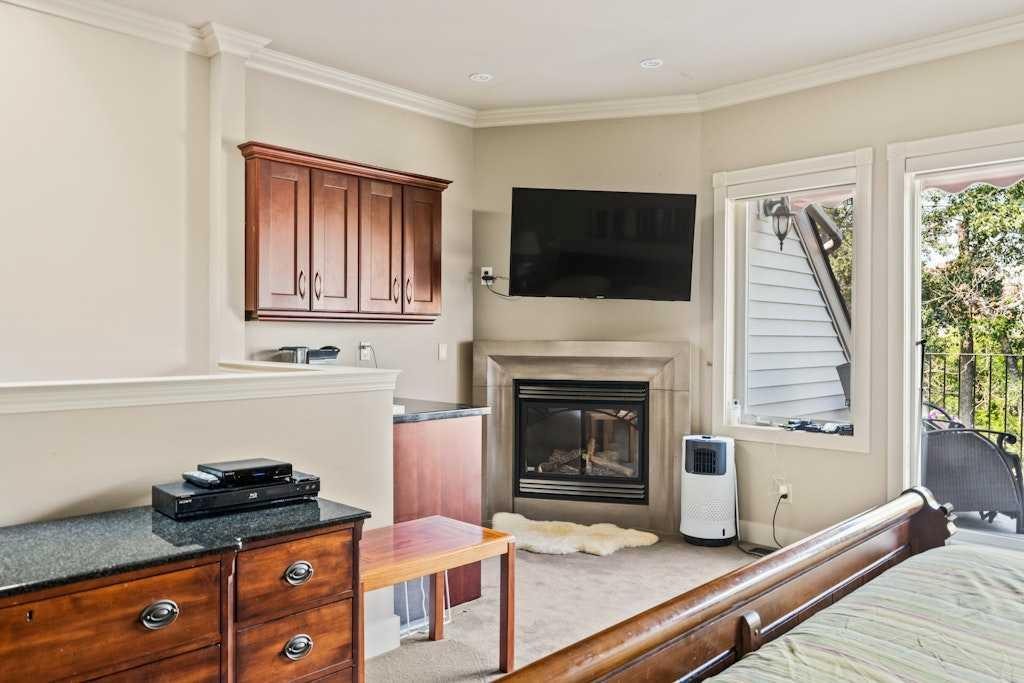 2421 Erlton Street Sw, Calgary, AB - Indoor Photo Showing Bedroom With Fireplace