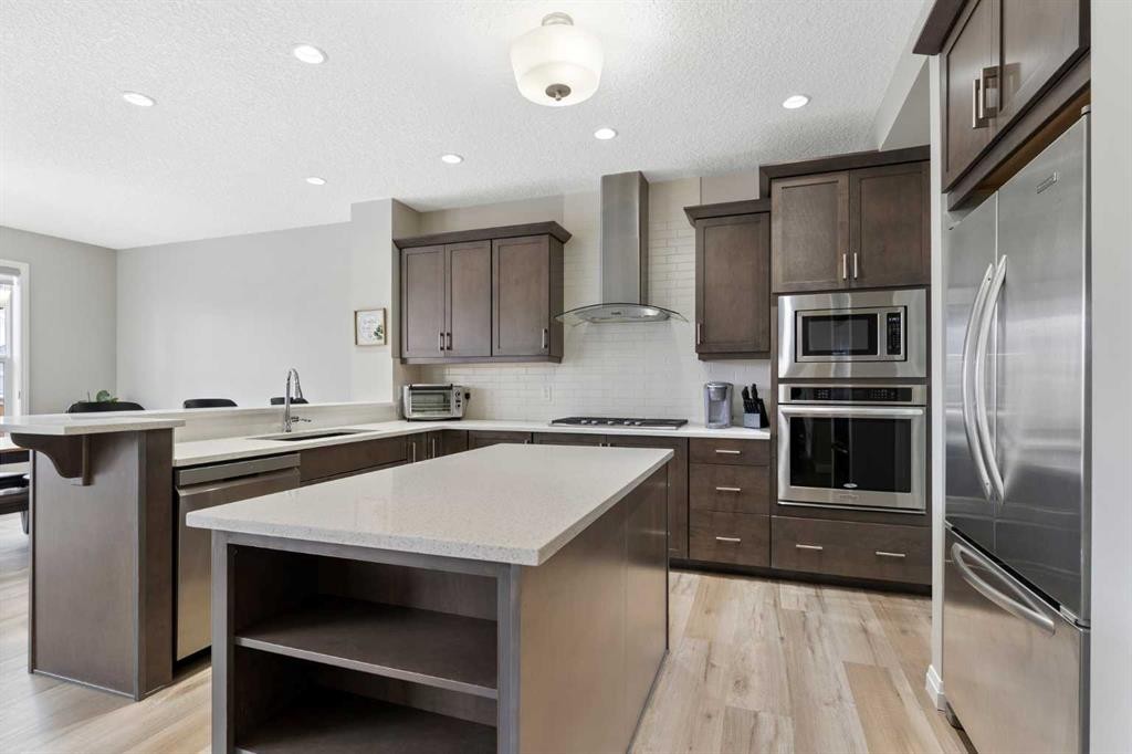 26 Marquis Heights Se, Calgary, AB - Indoor Photo Showing Kitchen With Stainless Steel Kitchen With Upgraded Kitchen