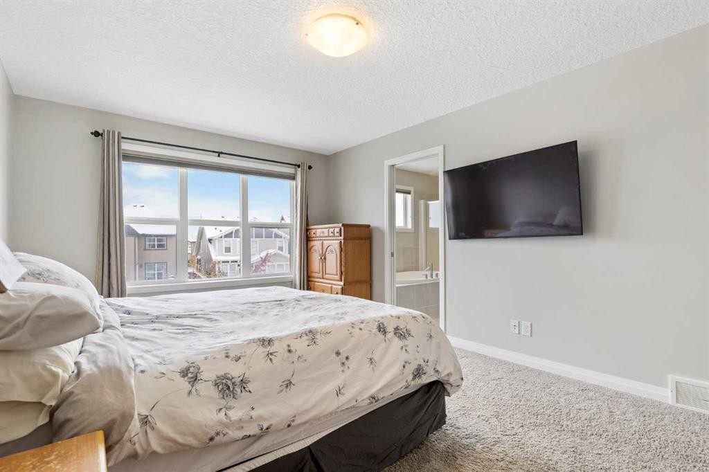 26 Marquis Heights Se, Calgary, AB - Indoor Photo Showing Bedroom