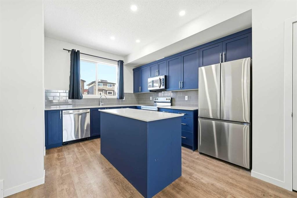 185 Edith Green Nw, Calgary, AB - Indoor Photo Showing Kitchen With Stainless Steel Kitchen With Upgraded Kitchen