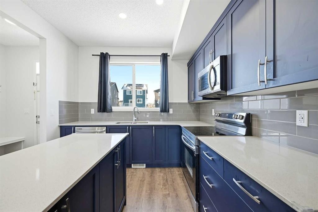 185 Edith Green Nw, Calgary, AB - Indoor Photo Showing Kitchen With Upgraded Kitchen