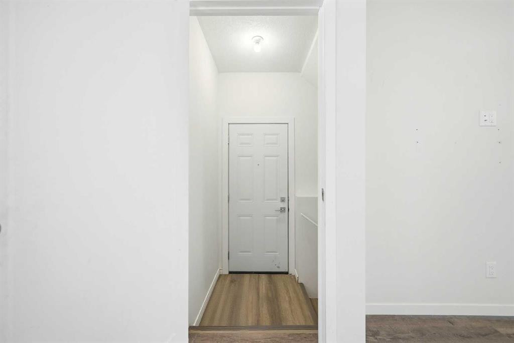 185 Edith Green Nw, Calgary, AB - Indoor Photo Showing Other Room
