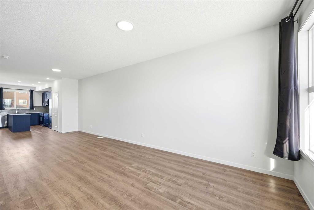 185 Edith Green Nw, Calgary, AB - Indoor Photo Showing Other Room