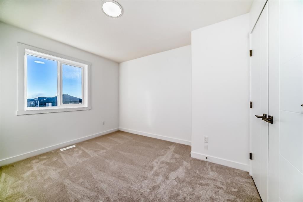 348 Cornerbrook Drive Ne, Calgary, AB - Indoor Photo Showing Other Room