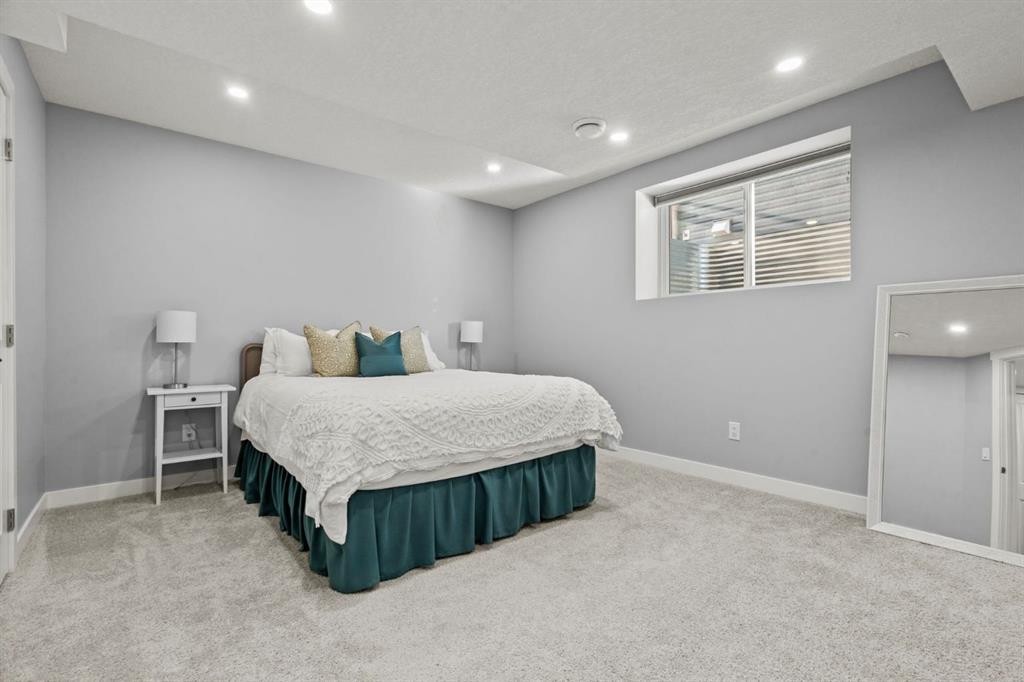 85 Mount Rae Heights, Okotoks, AB - Indoor Photo Showing Bedroom